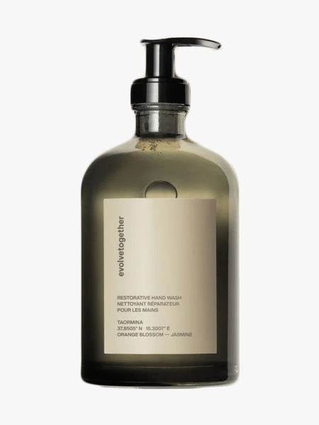 Evolvetogether Restorative Hand Wash in branded component on a light gray background